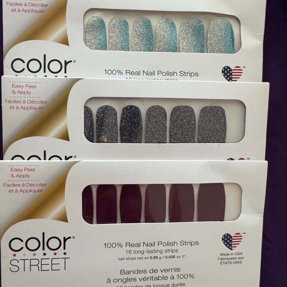 Color Street Nail Polish Strips in Blue, Silver, Black, and Red